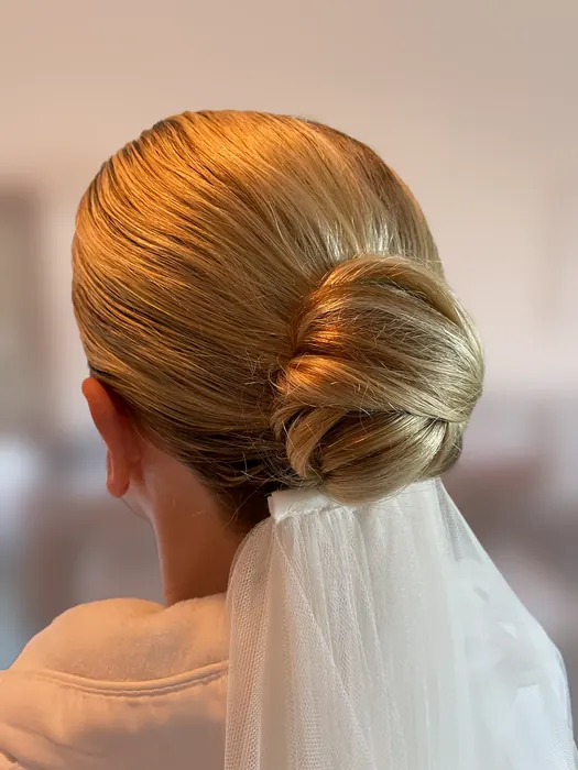 Sleek blonde bridal chignon with veil, Santa Barbara wedding hair